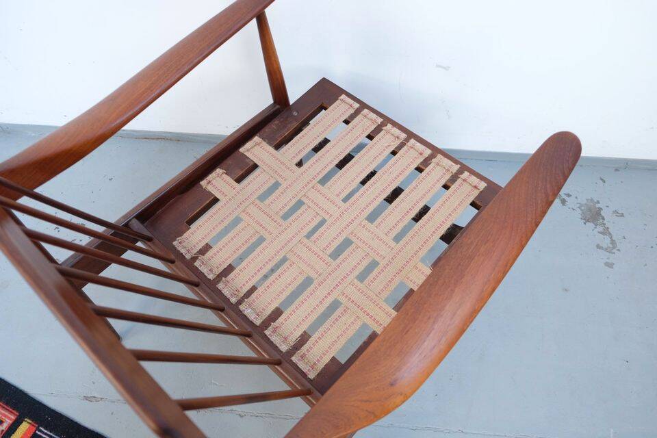 Vintage teak lounge chair, retro 1960s–70s style.