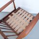 Vintage teak lounge chair, retro 1960s–70s style.