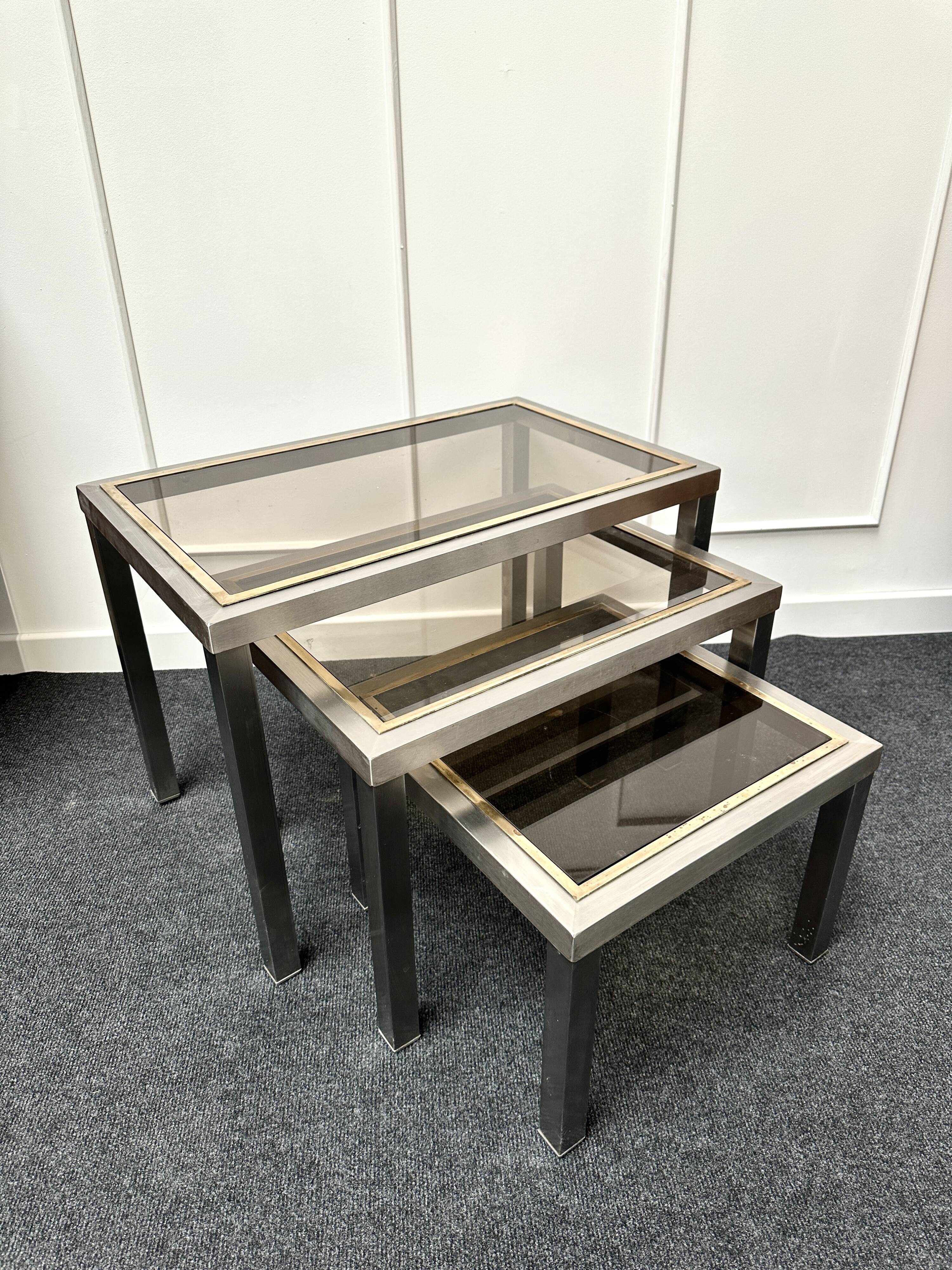 Smoked glass nesting coffee table