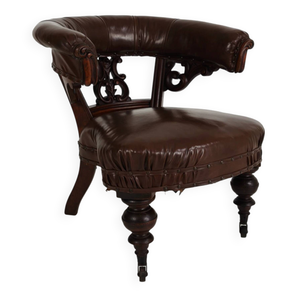 Fauteuil ancien en cuir par Robson & Son – bois sculpté et roulettes, Newcastle