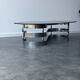 Table basse design en verre fumé et chrome 1970