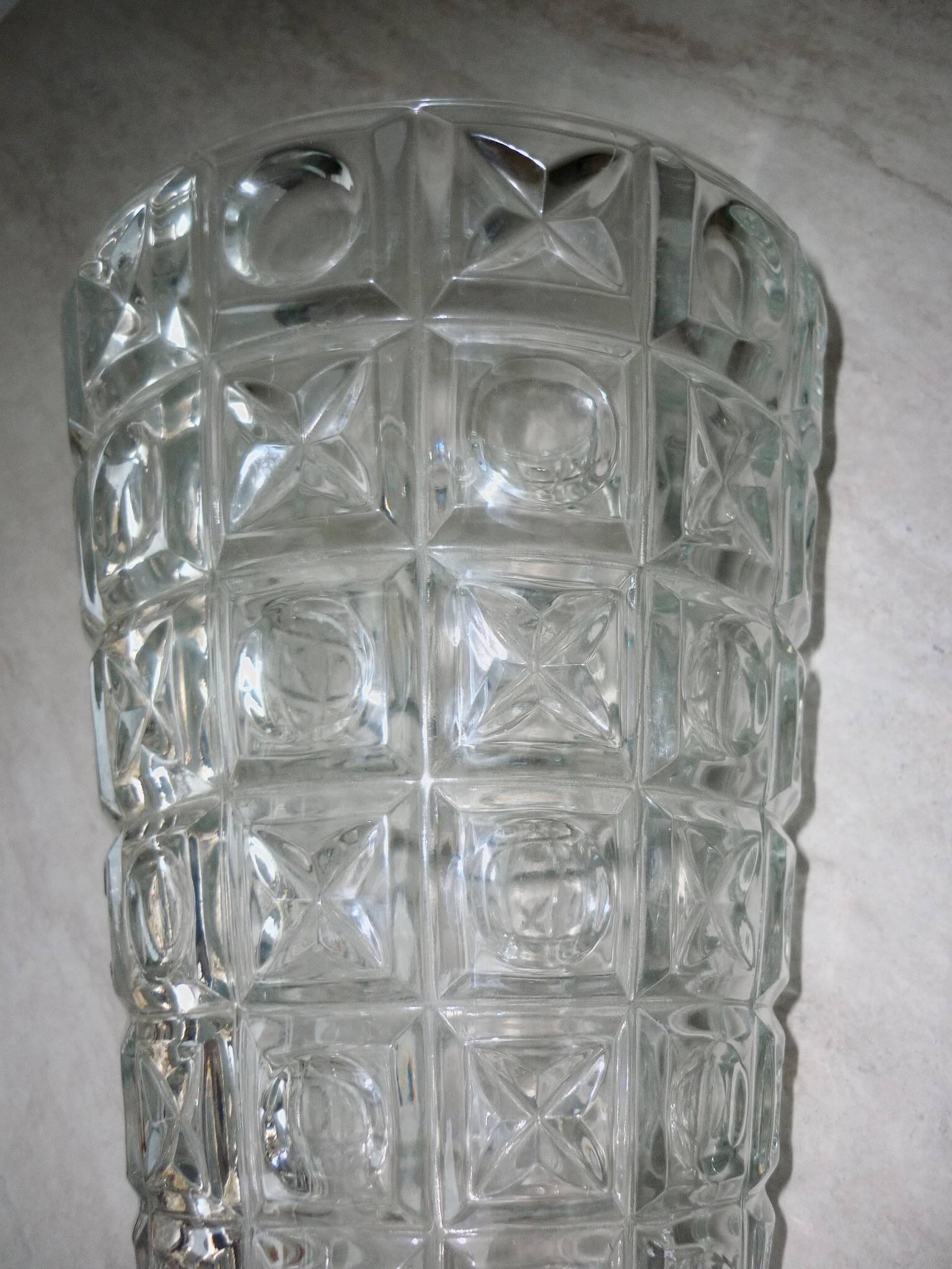 Transparent glass vase with art deco geometric patterns