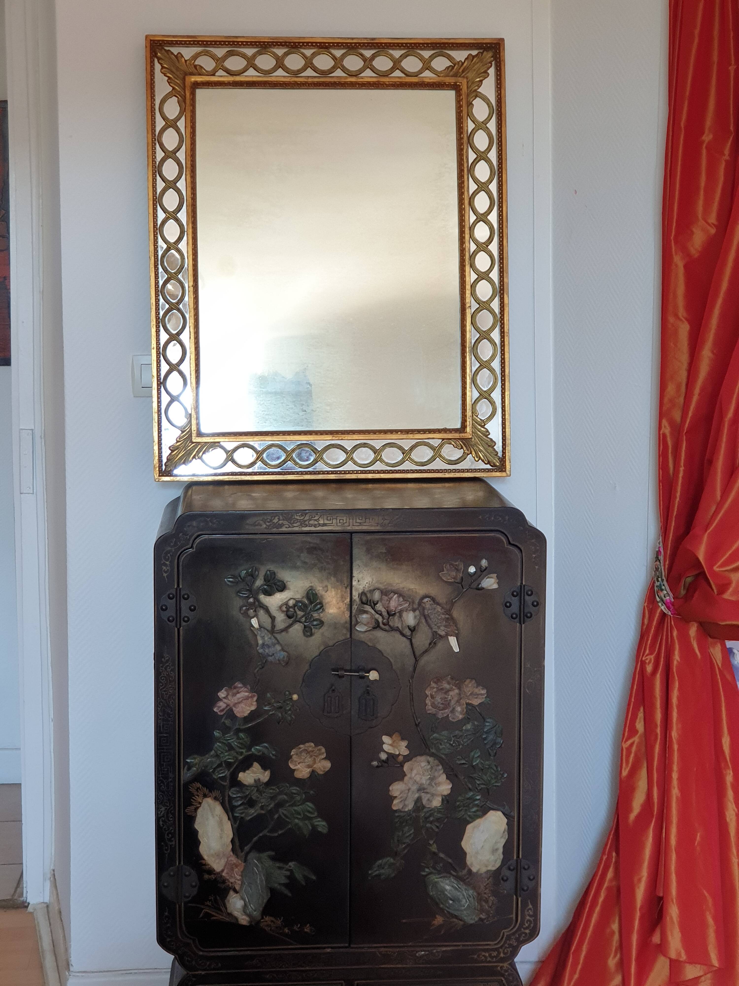 Classic antique mirror in gilded wood