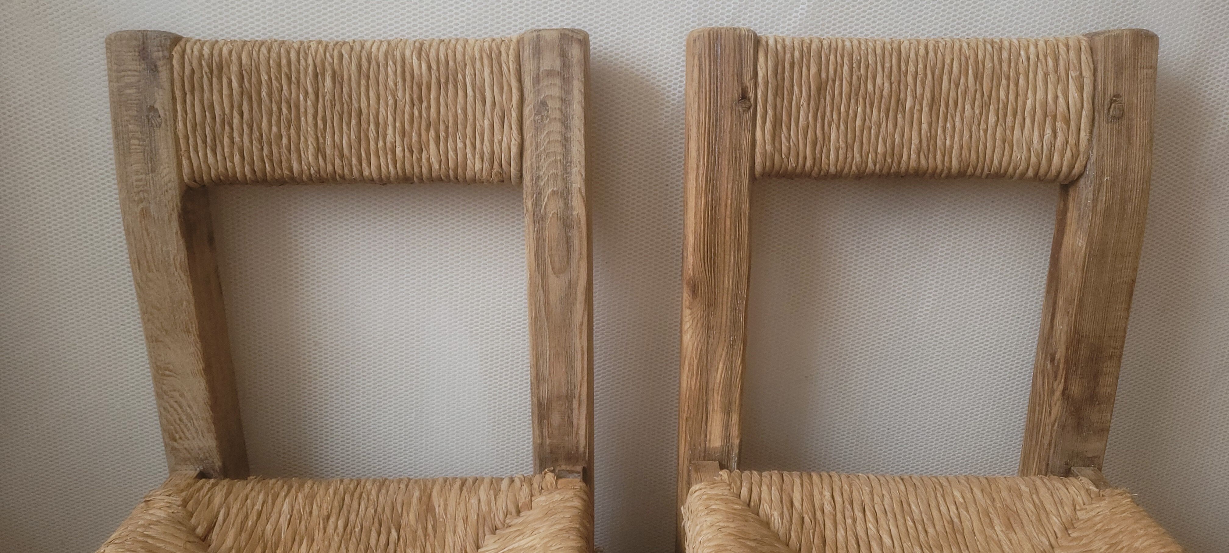 Pair of brutalist chairs in wood and straw