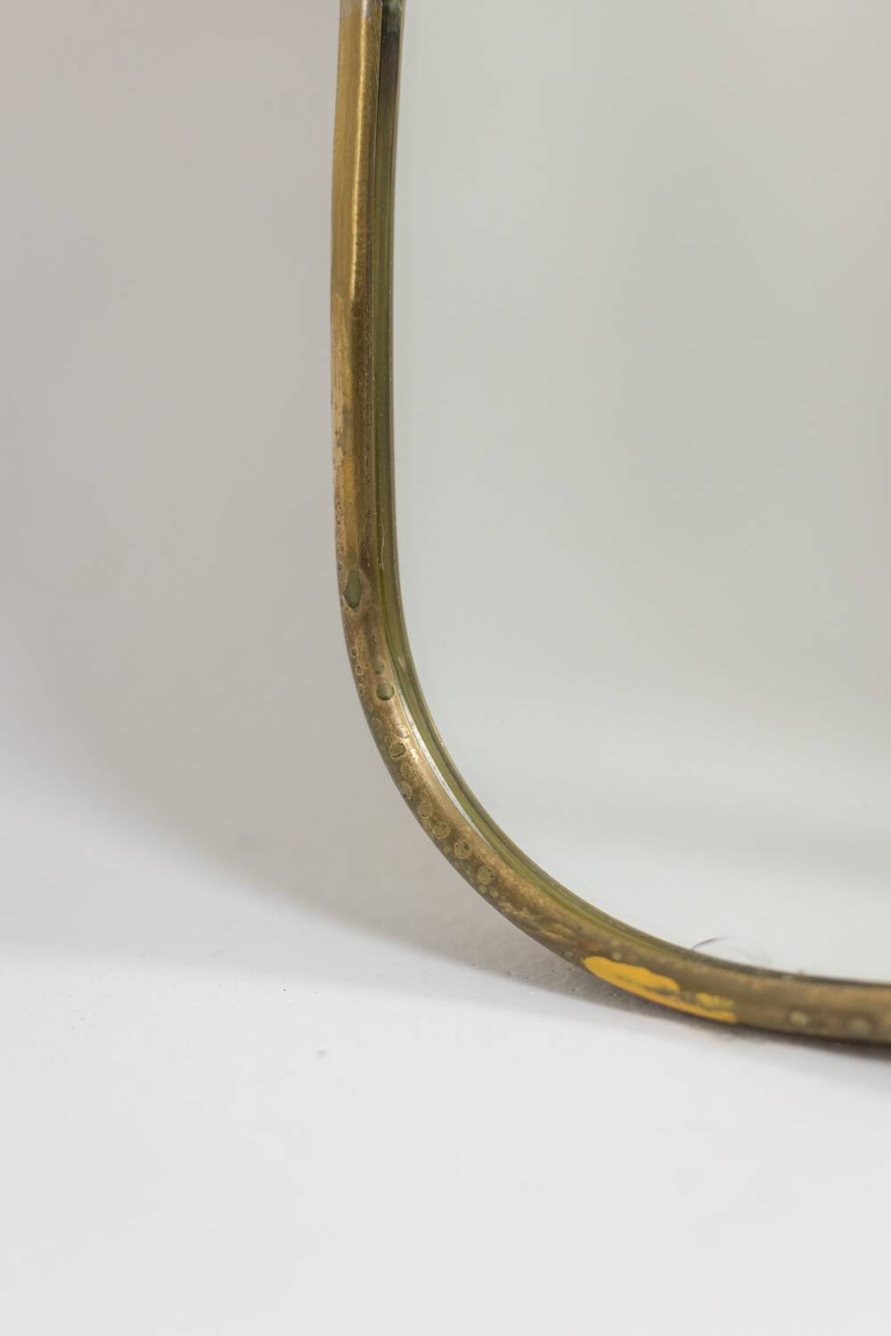 Mirror with a gilded brass frame. 1980s.