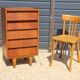 Dark chest of drawers with 5 drawers from the 1950s