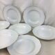 Hollow porcelain plates of pure white and gold