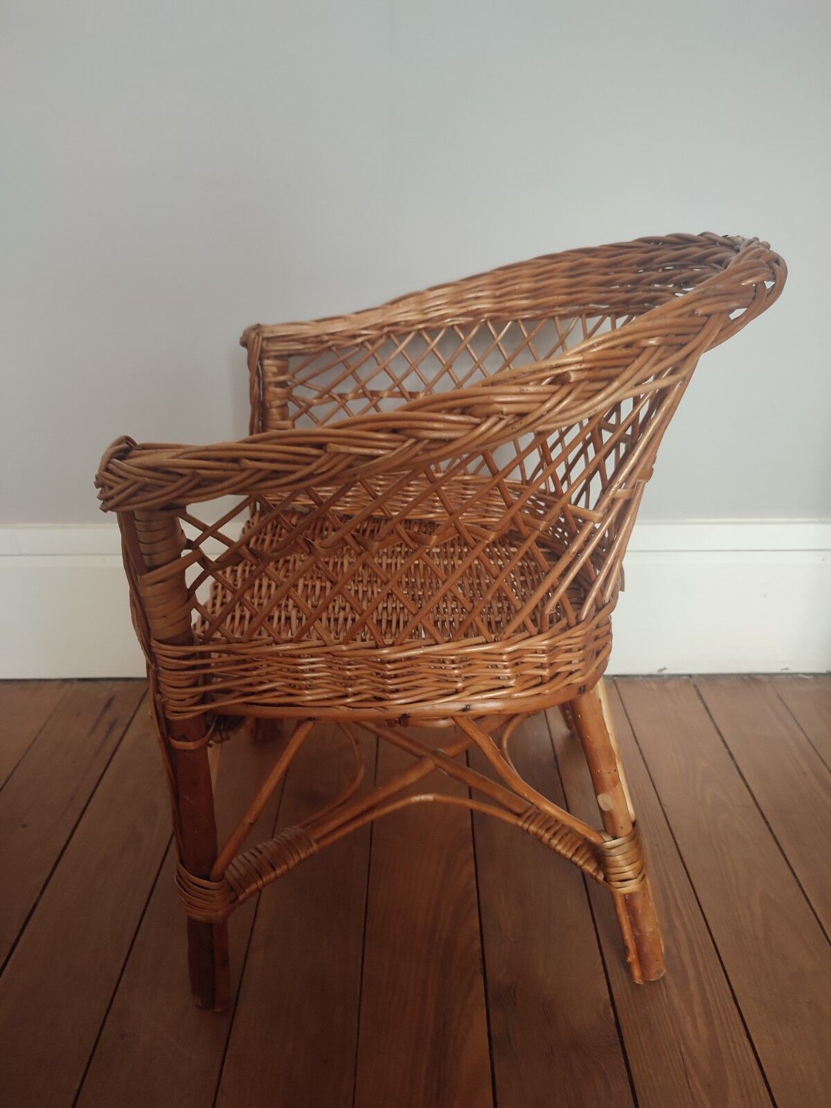 Vintage wicker children's armchair