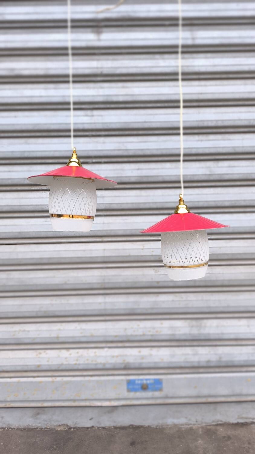 Pair of enamelled sheet metal and glass pendant lights