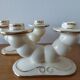 Pair of cream ceramic candlesticks with gold trim circa 1930-1950
