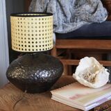 Stoneware lamp with cane shade