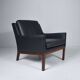 Leather and rosewood armchair by Kai lyngfeldt-Larsen. Denmark