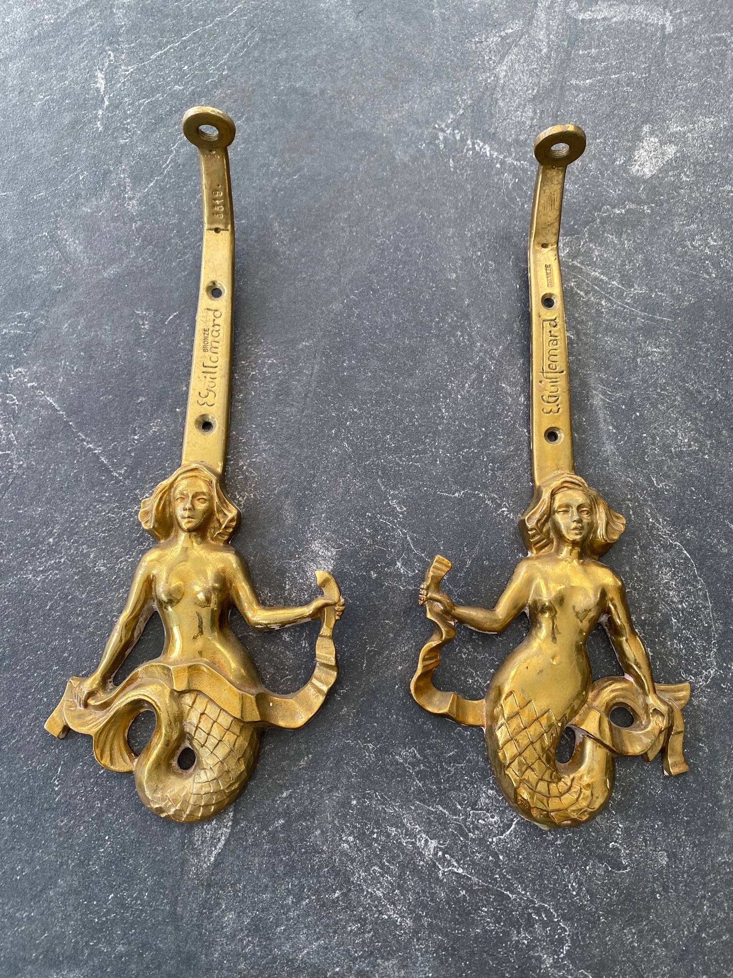 Pair of Guillemard bronze mermaid wall lights