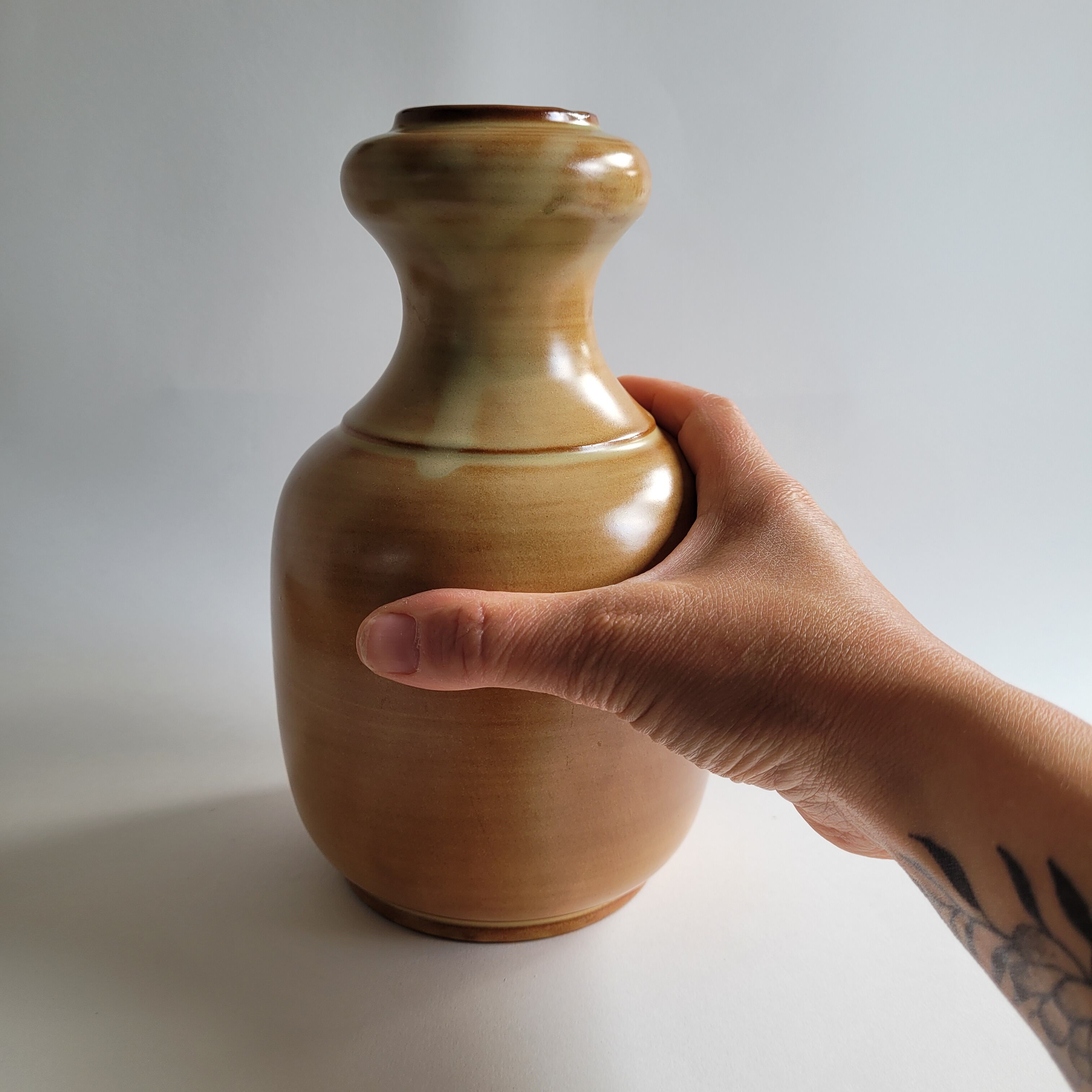 Enamelled sandstone vase
