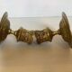 Pair of worked brass candlesticks