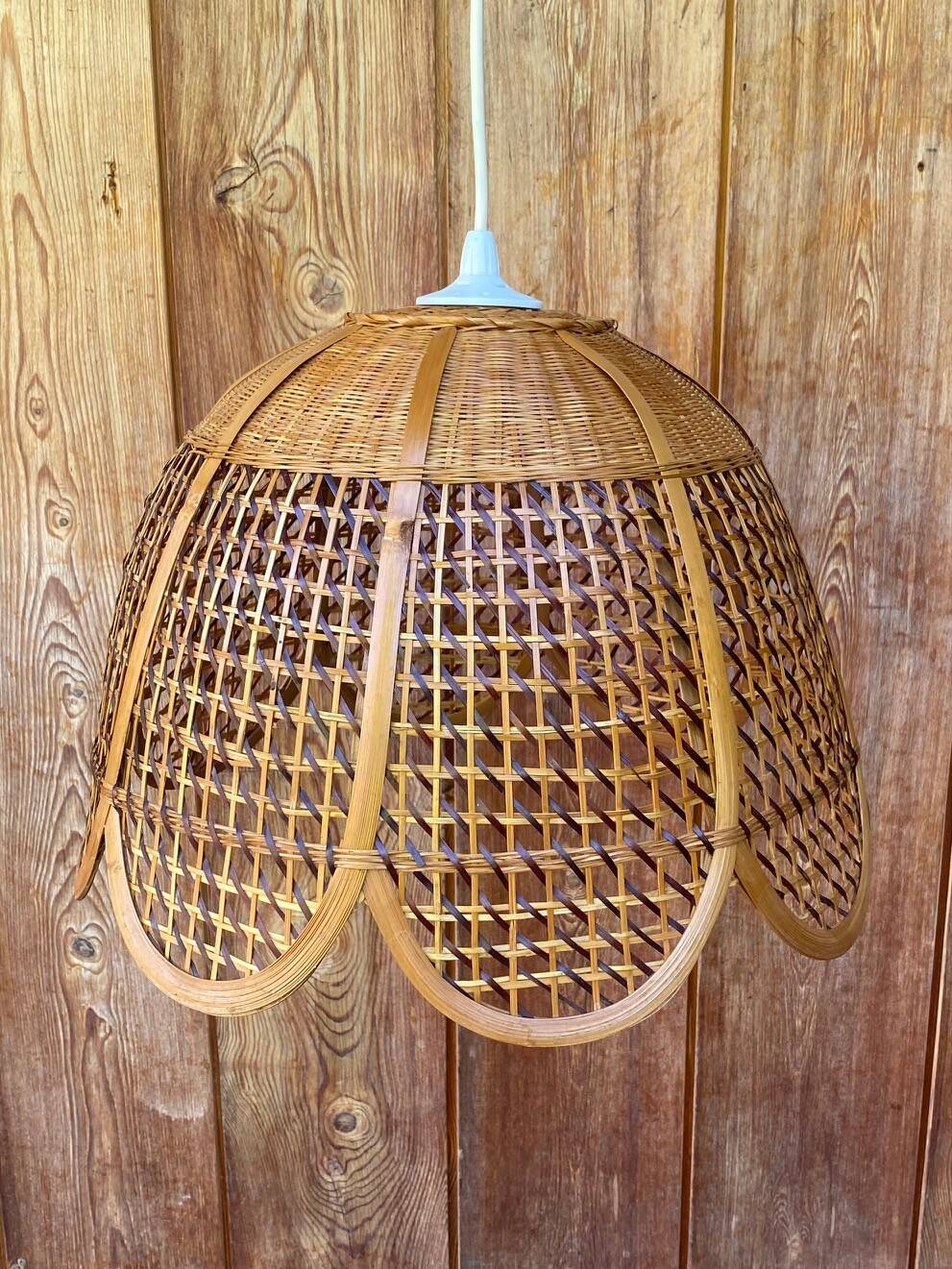Rattan and cane lampshade in the shape of a flower from the 1970s.