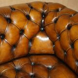 Vintage Chesterfield serpentine luxury sofa in restored leather