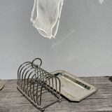 Flat silver metal tray with duck and toast