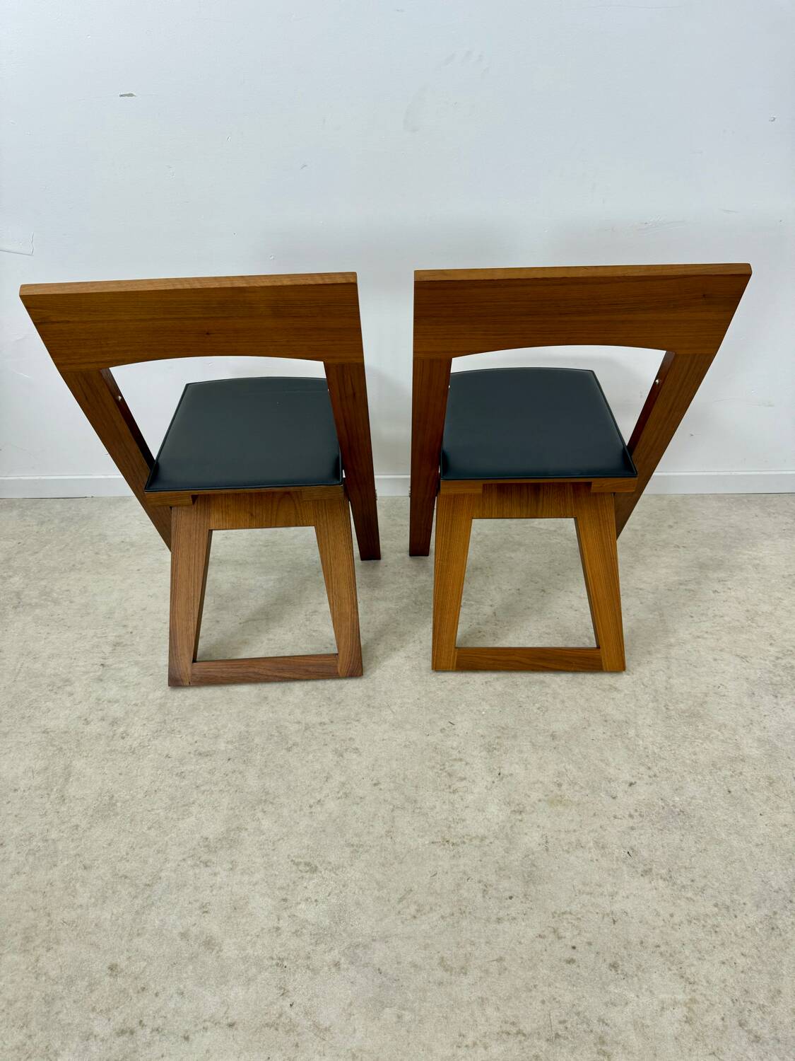 2 old folding chairs in wood and leather, postmodern design from the 80s vintage