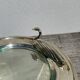 Flat silver metal tray with duck and toast