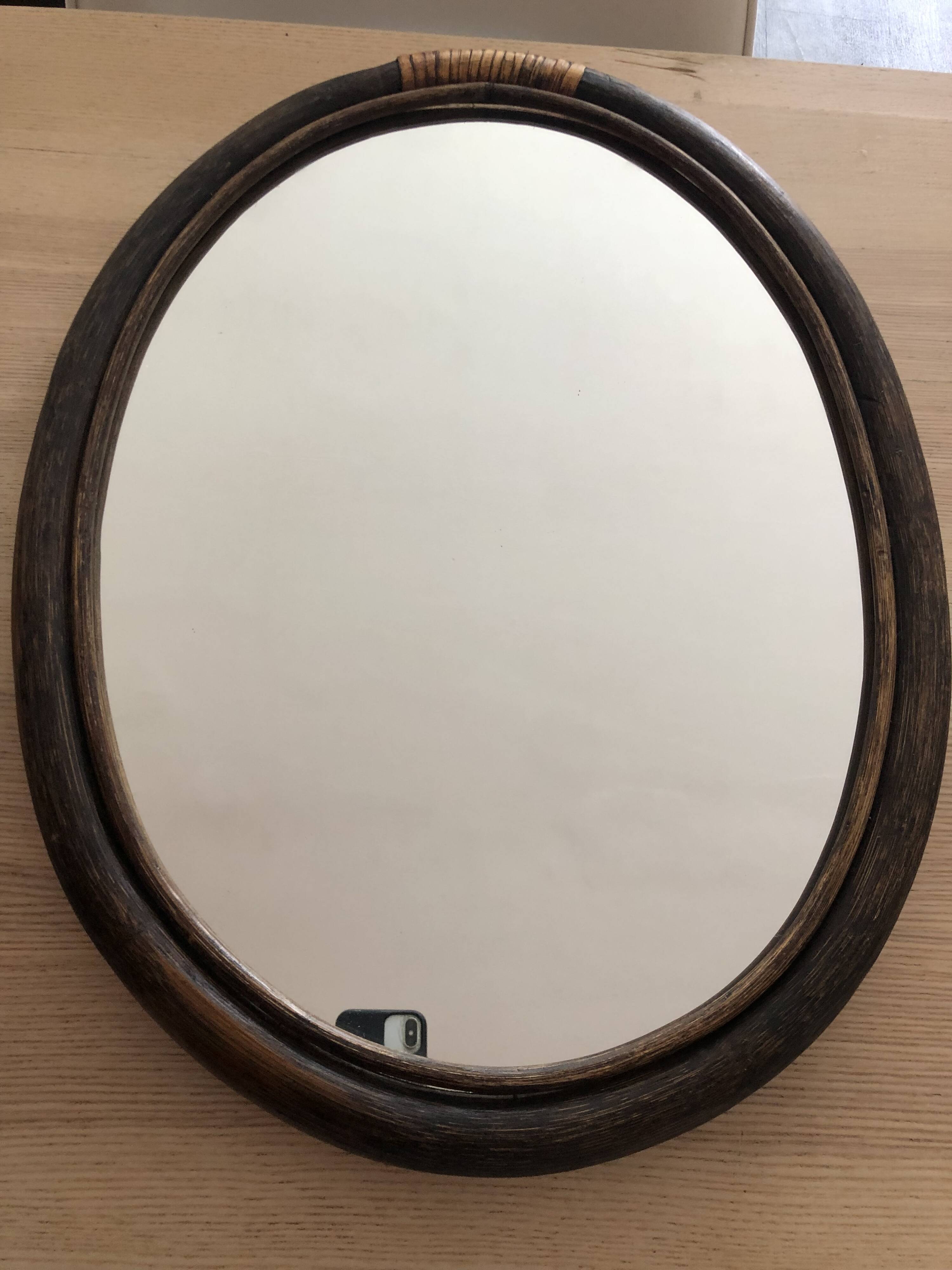 Oval rattan mirror
