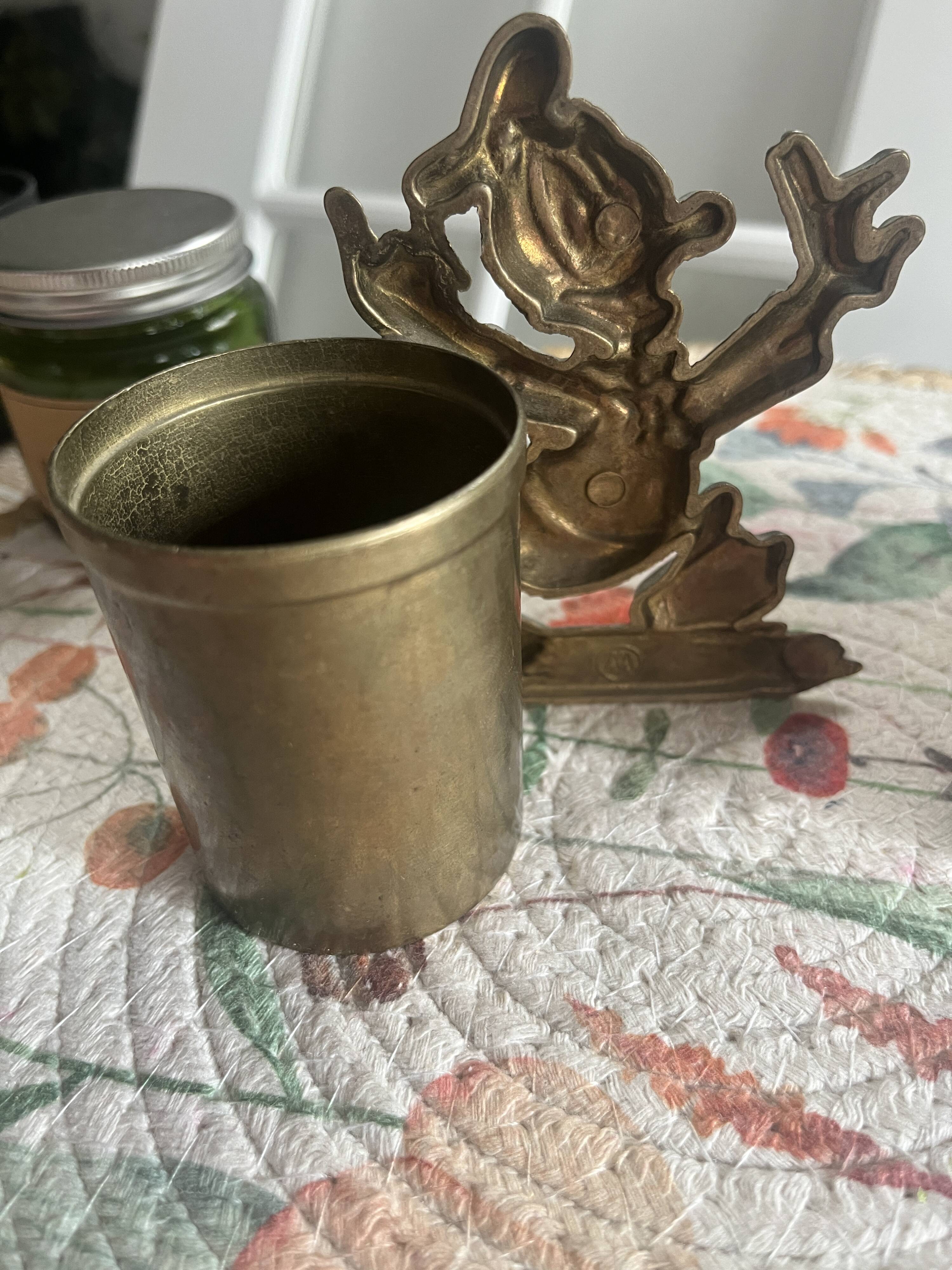 Rare brass yellow Disney pencil holders. 1960p