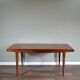 Extending teak table