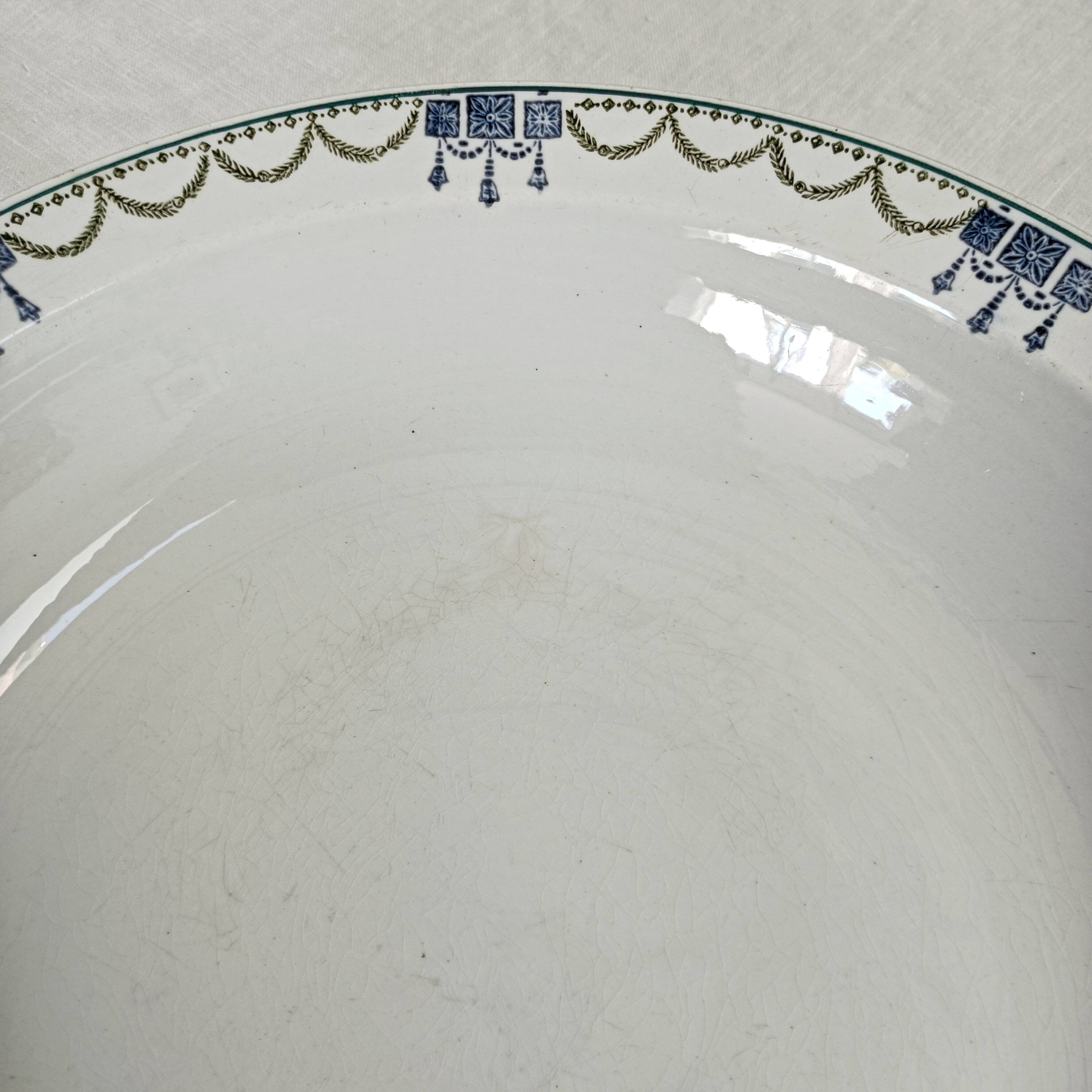 Large hollow dish iron earth Company Amandinoise