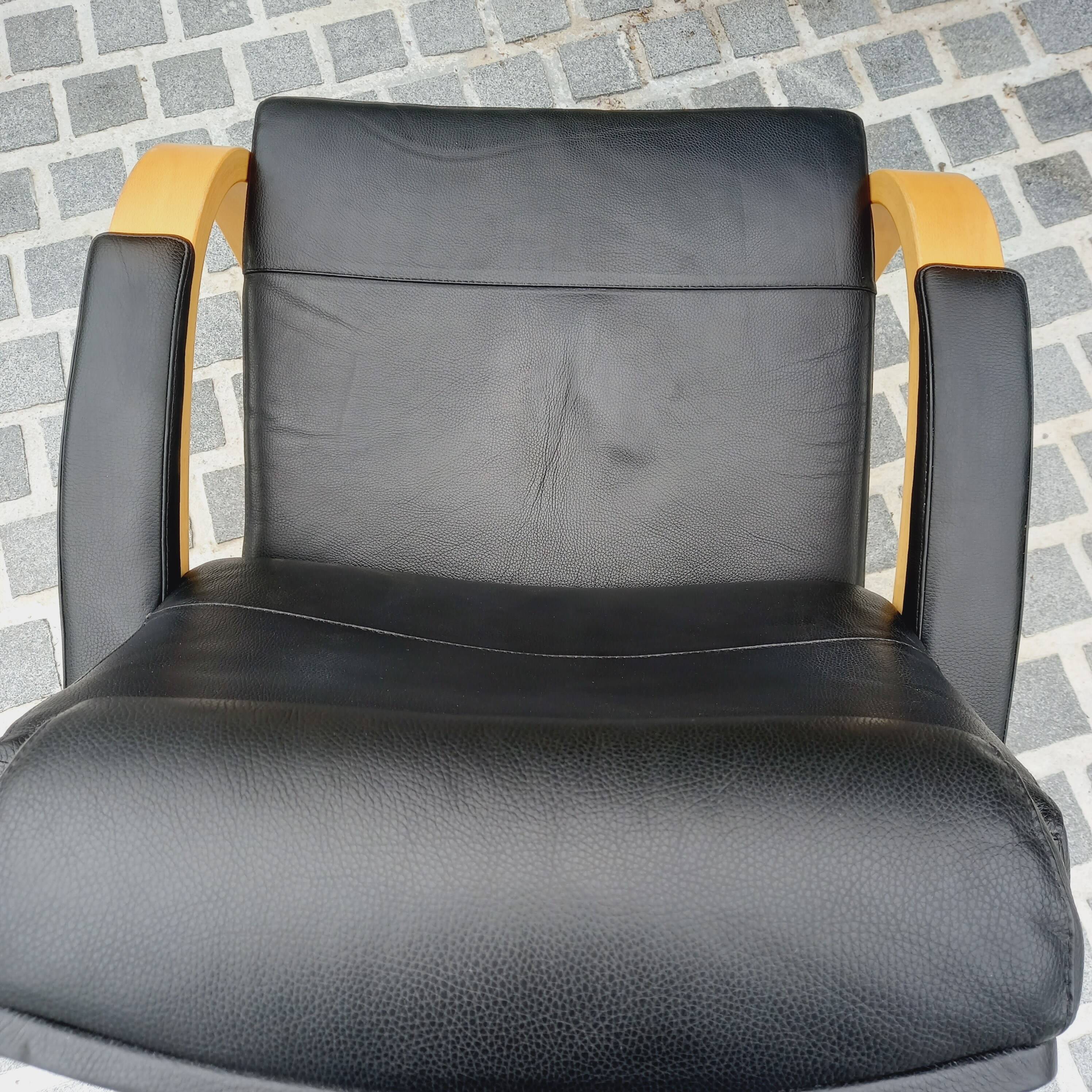 Pair of NELO Scandinavian armchairs