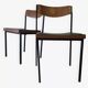 Pair of teak and iron stacking chairs, 1960s