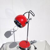Red and chrome eyeball lamp