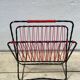 Scoubidou and wrought iron magazine rack