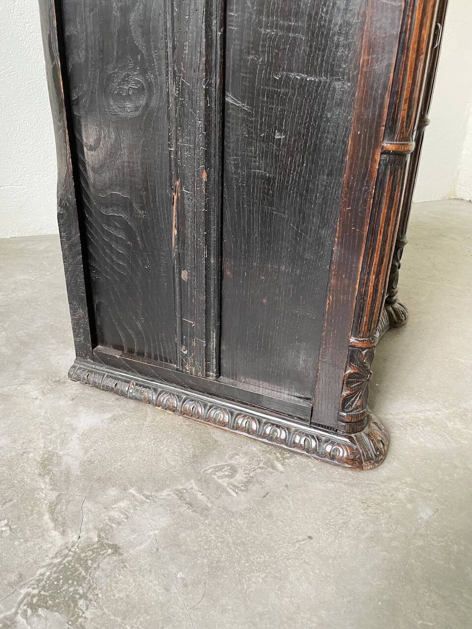 19th century chest of drawers in carved blackened pine