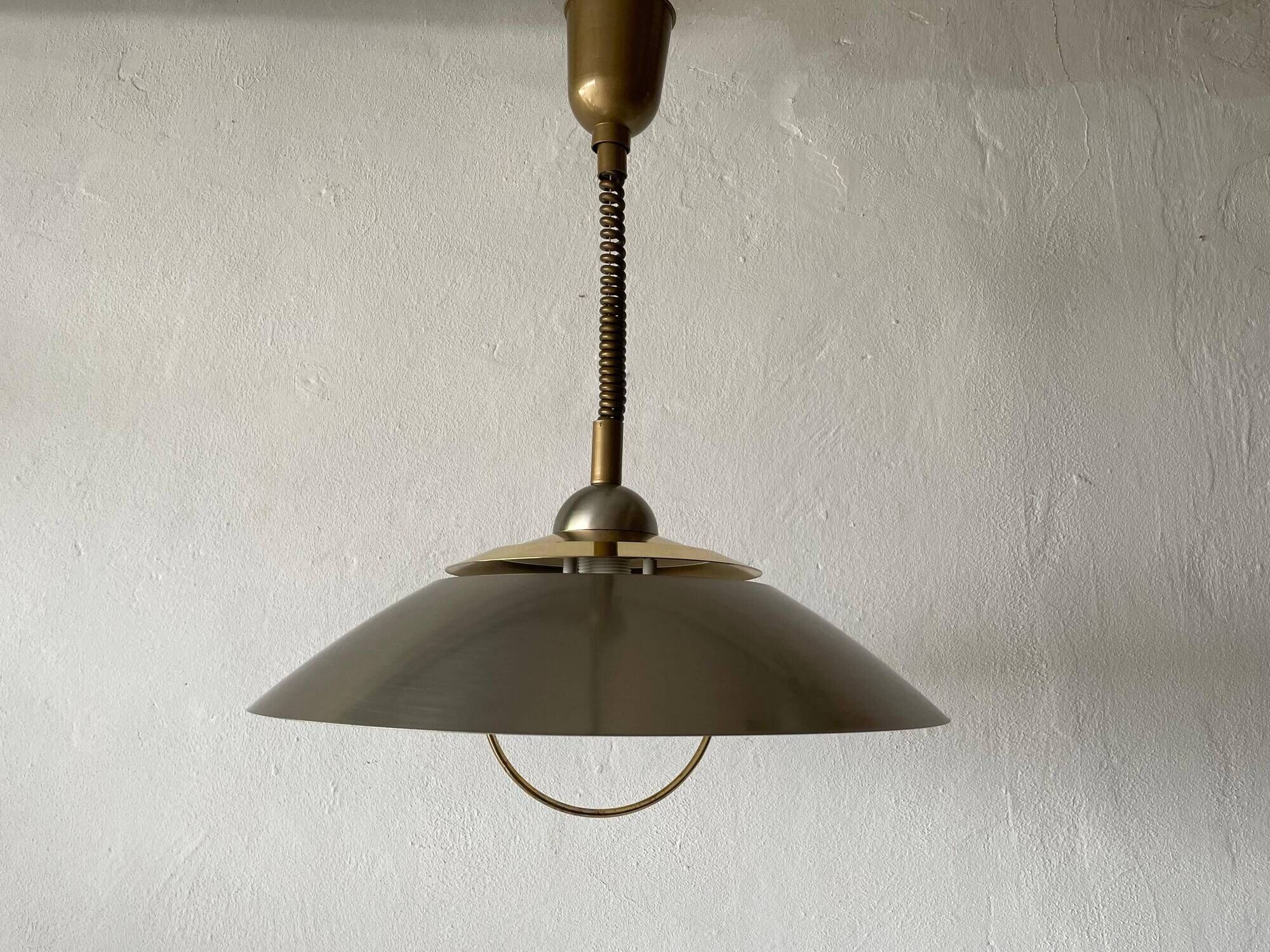 Suspended lamp in chrome and gold metal by TZ, 1970s, Germany.