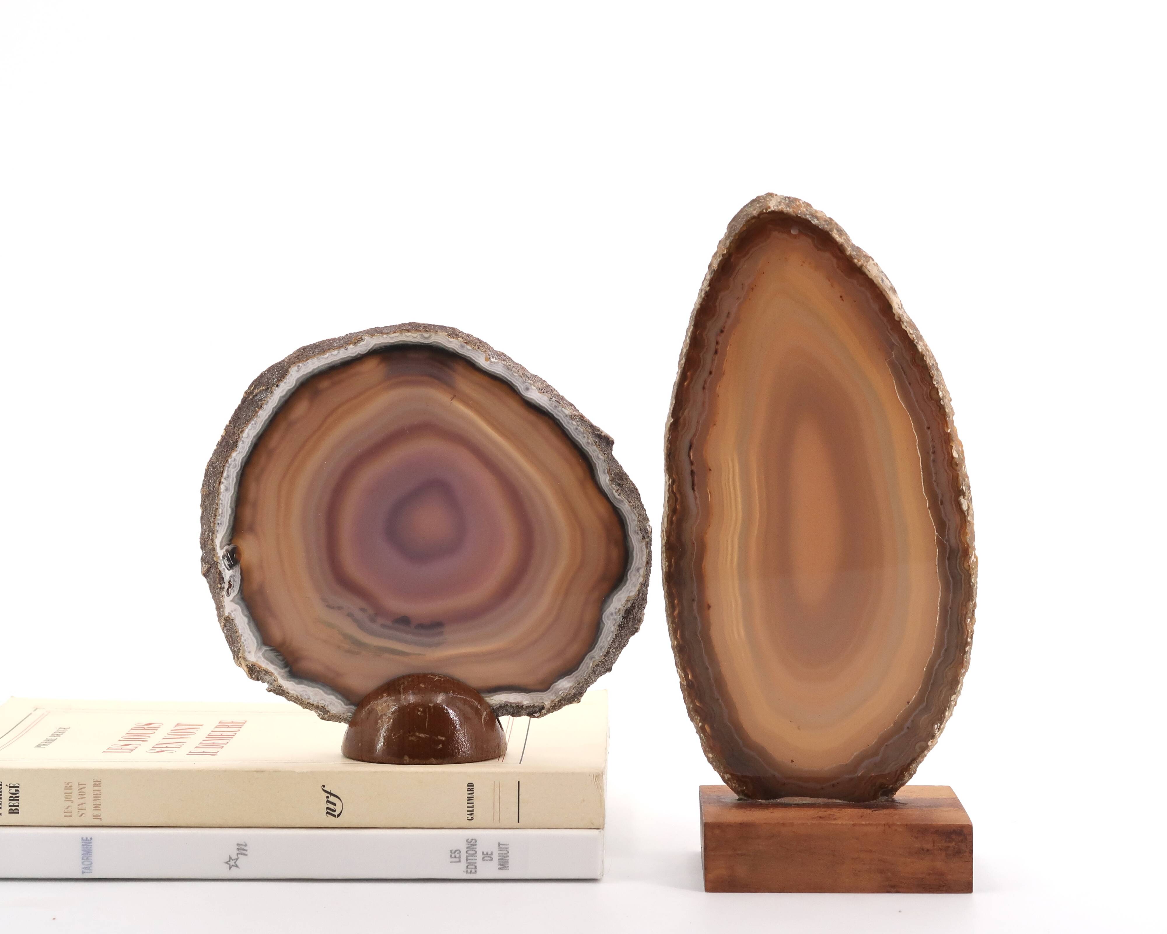 Two agate slices on wooden base, 1970s