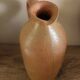 Vintage stoneware liqueur bottle with handle