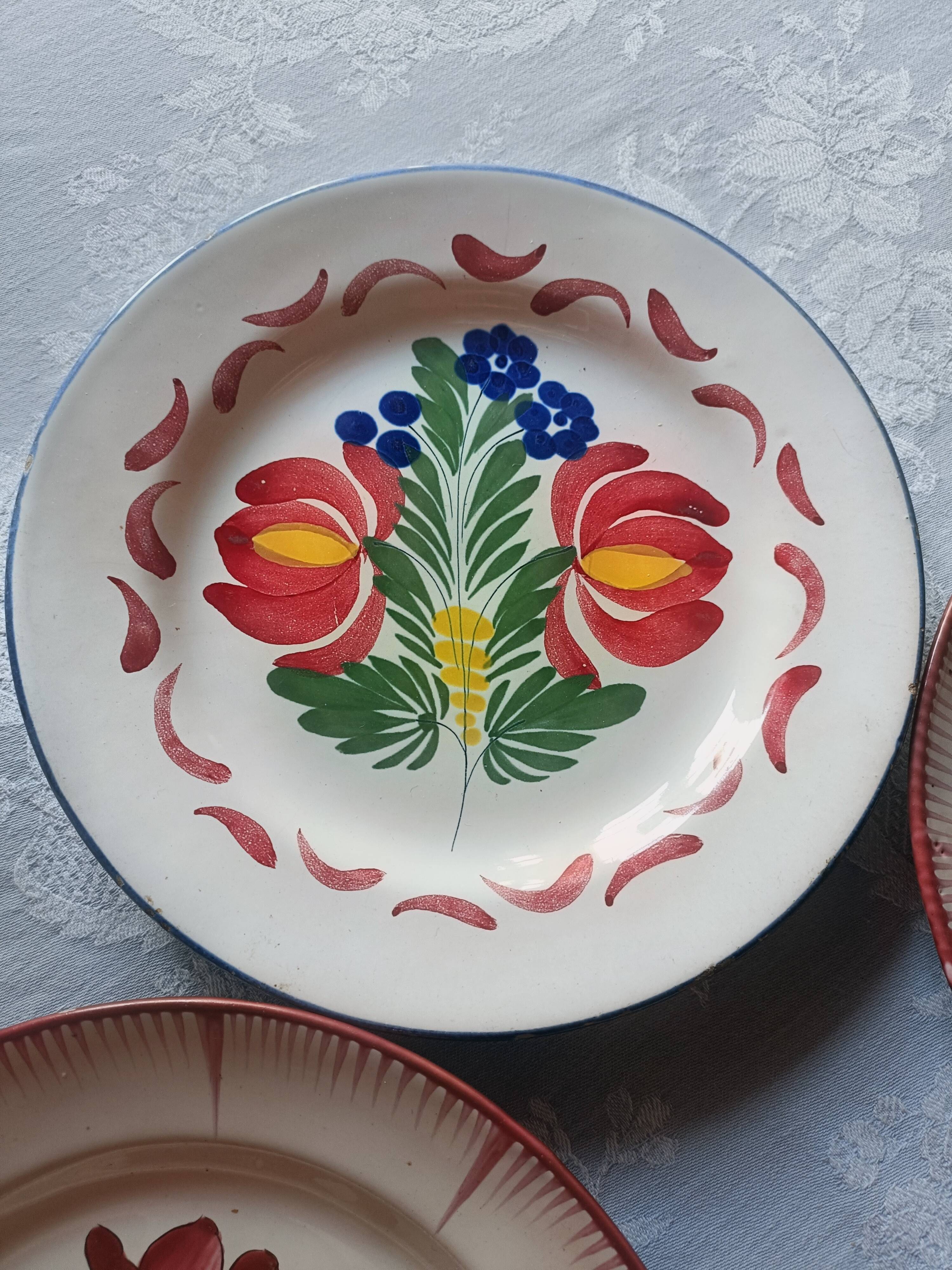 Set of 4 19th-century earthenware plates.