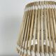 Vintage ceramic lamp with wicker and cotton shade.
