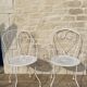 Lot de 2 anciens fauteuils de jardin en fer forgé