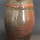 Ceramic pitcher from the 20th century with a signature to identify.