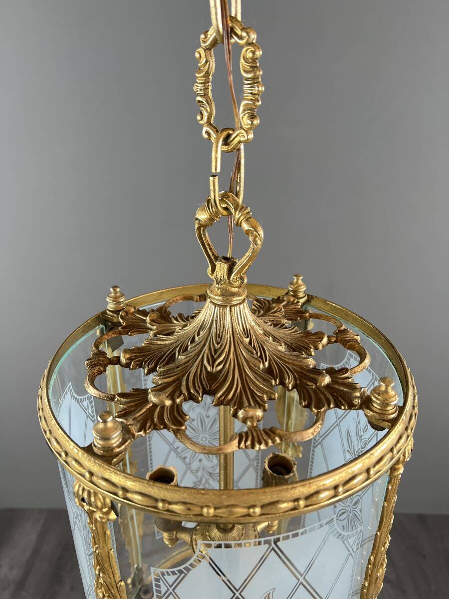 Louis XVI style lantern in gilded bronze and engraved glass, 20th century.