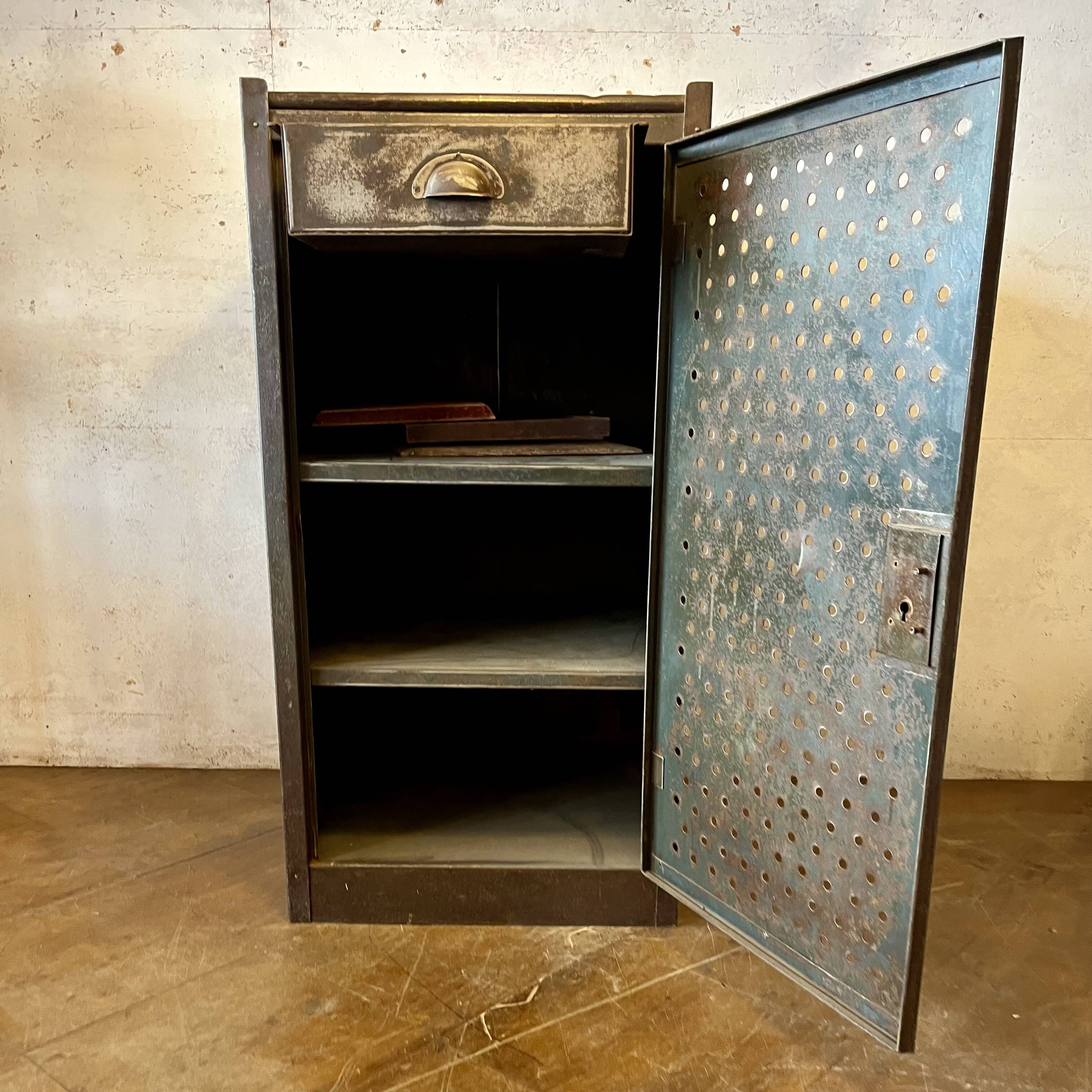 Small industrial storage unit in perforated metal – Early 20th century -