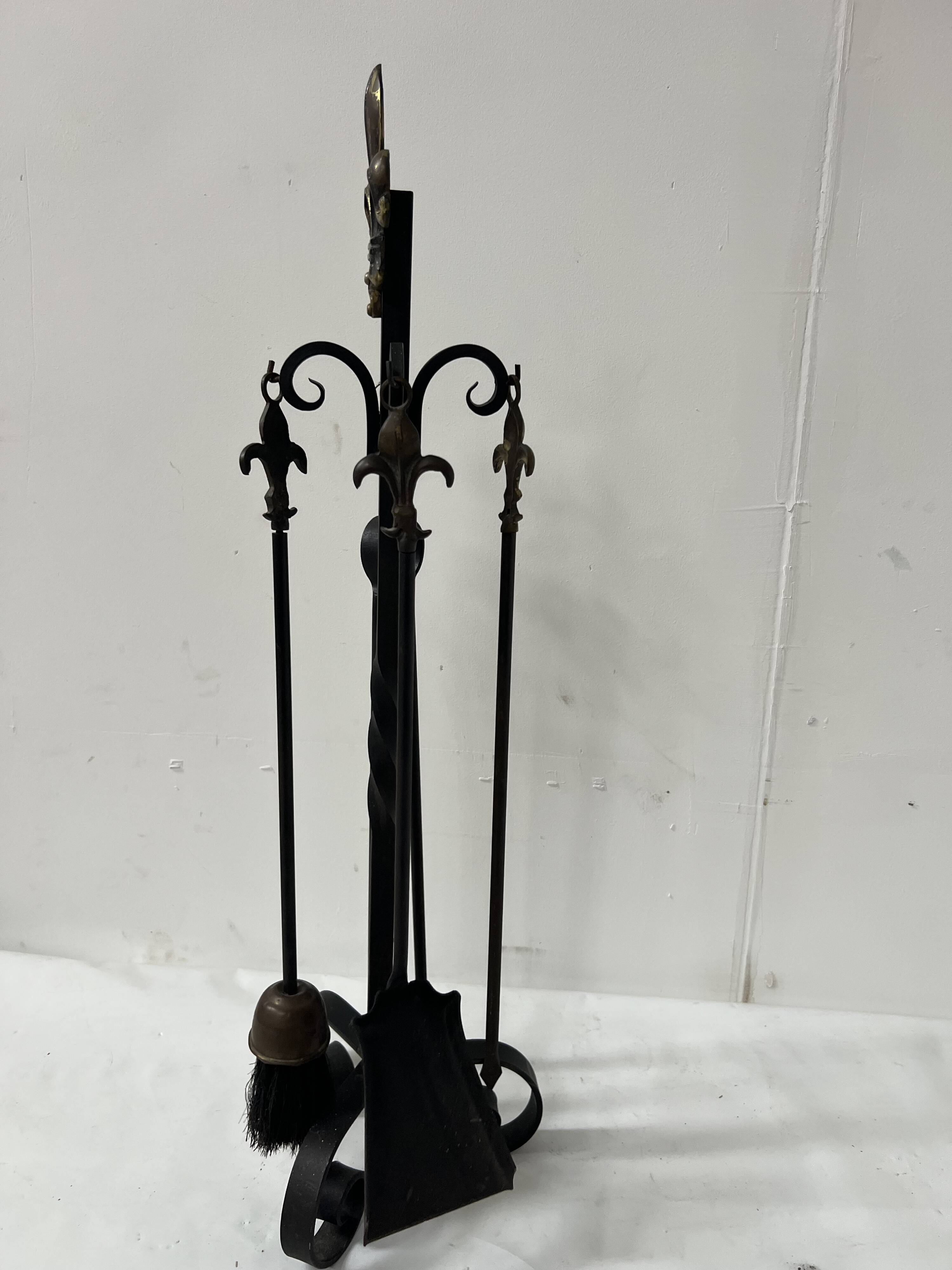 20th century wrought iron and bronze fireplace set