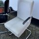 Paire de fauteuils en acier tubulaire
