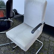 Paire de fauteuils en acier tubulaire