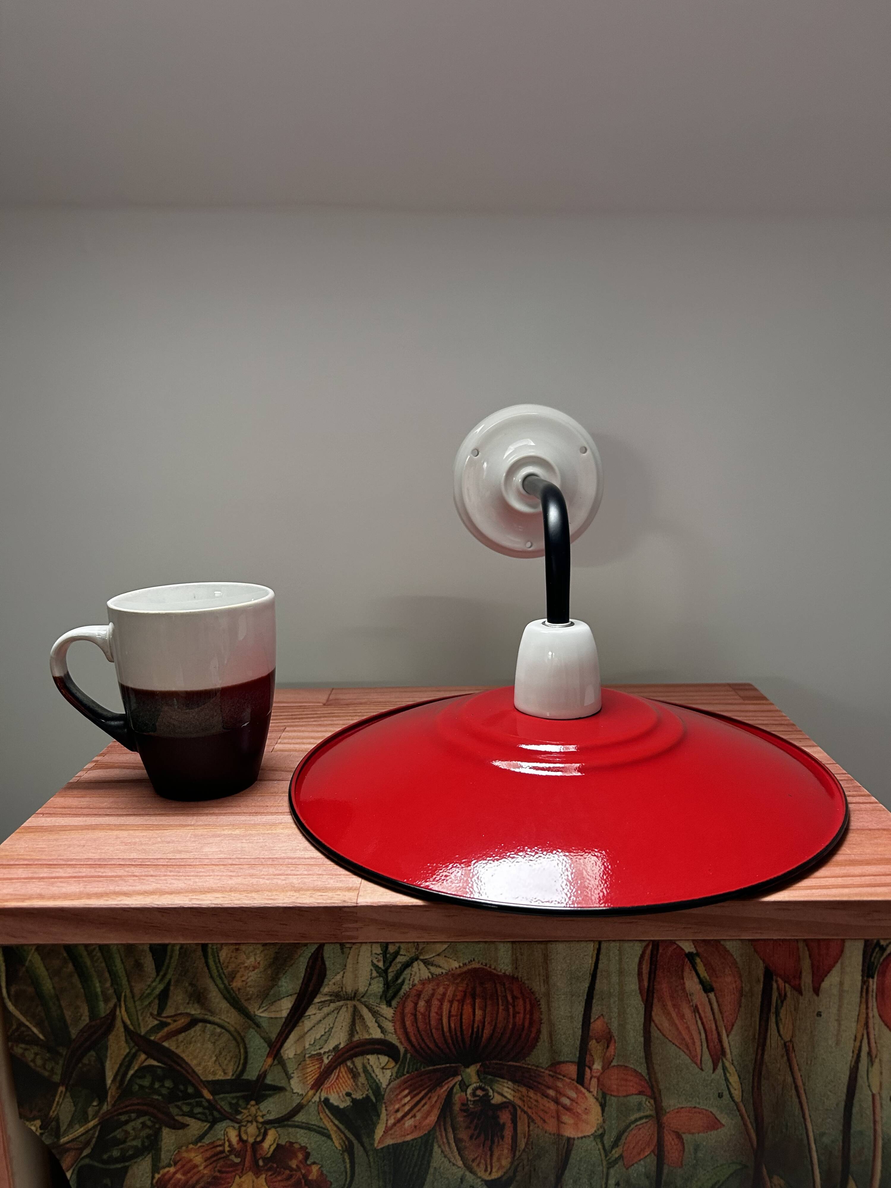 Red enamelled sheet metal wall light