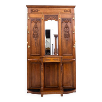 Hallway wardrobe, France, circa 1910.