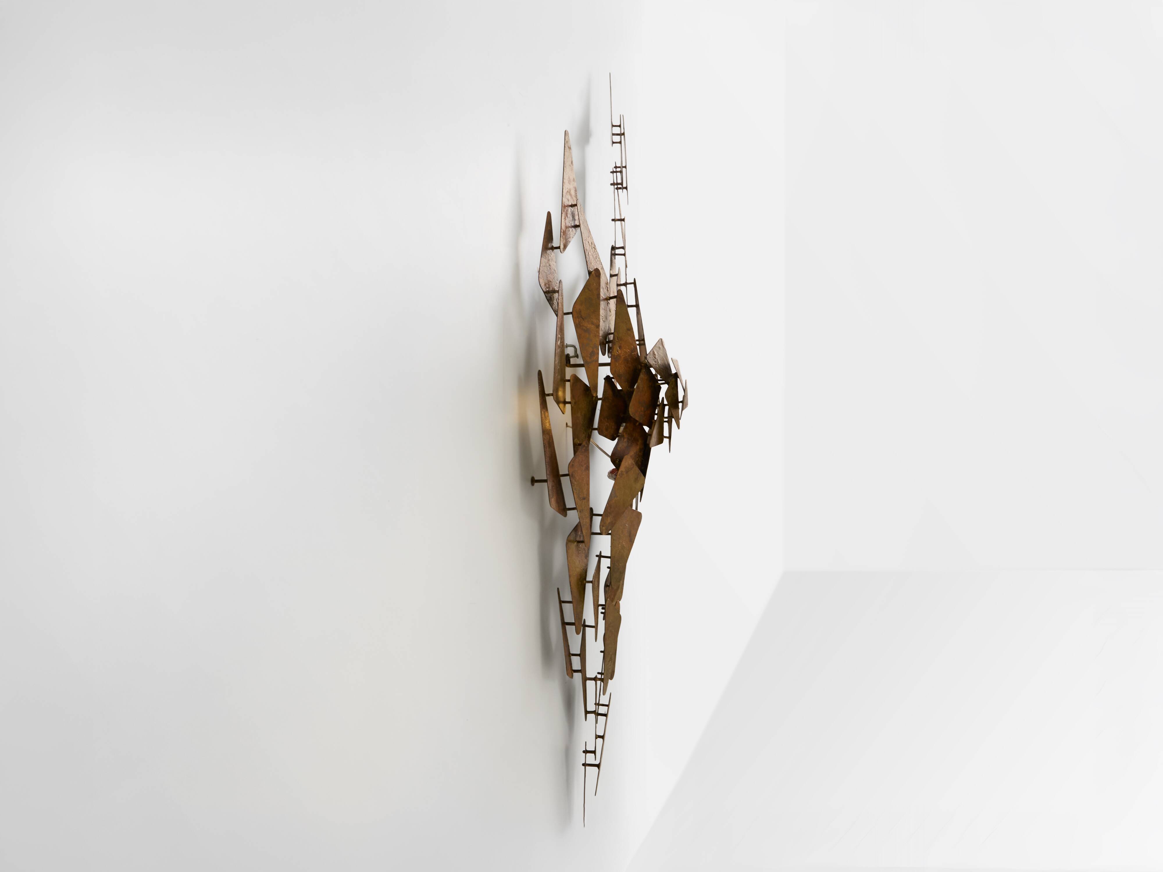 Auguste fixed sculpture metal appliqué patinated around 1970