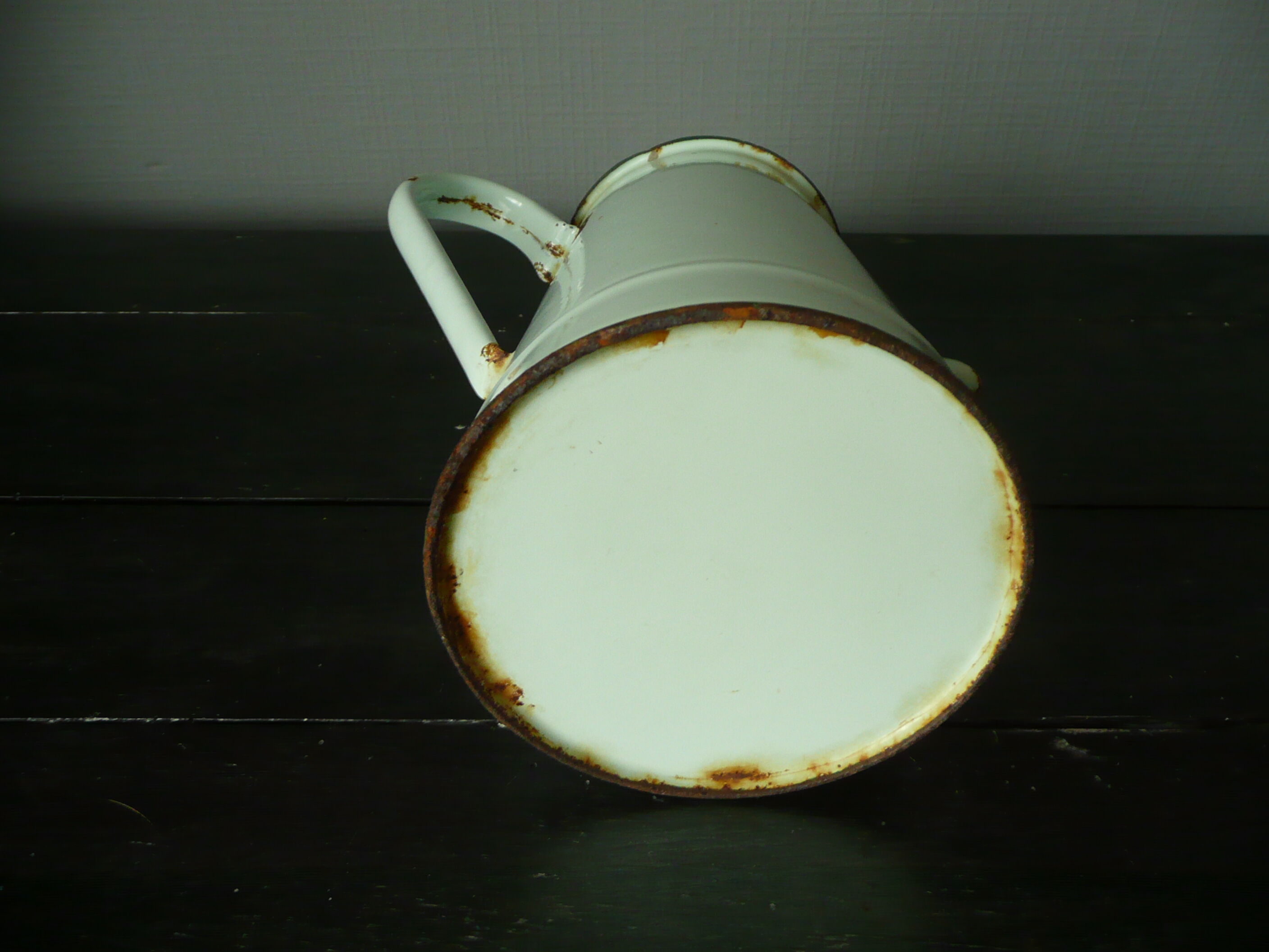 Antique enamelled pitcher