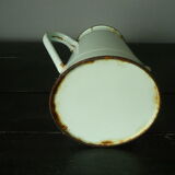 Antique enamelled pitcher